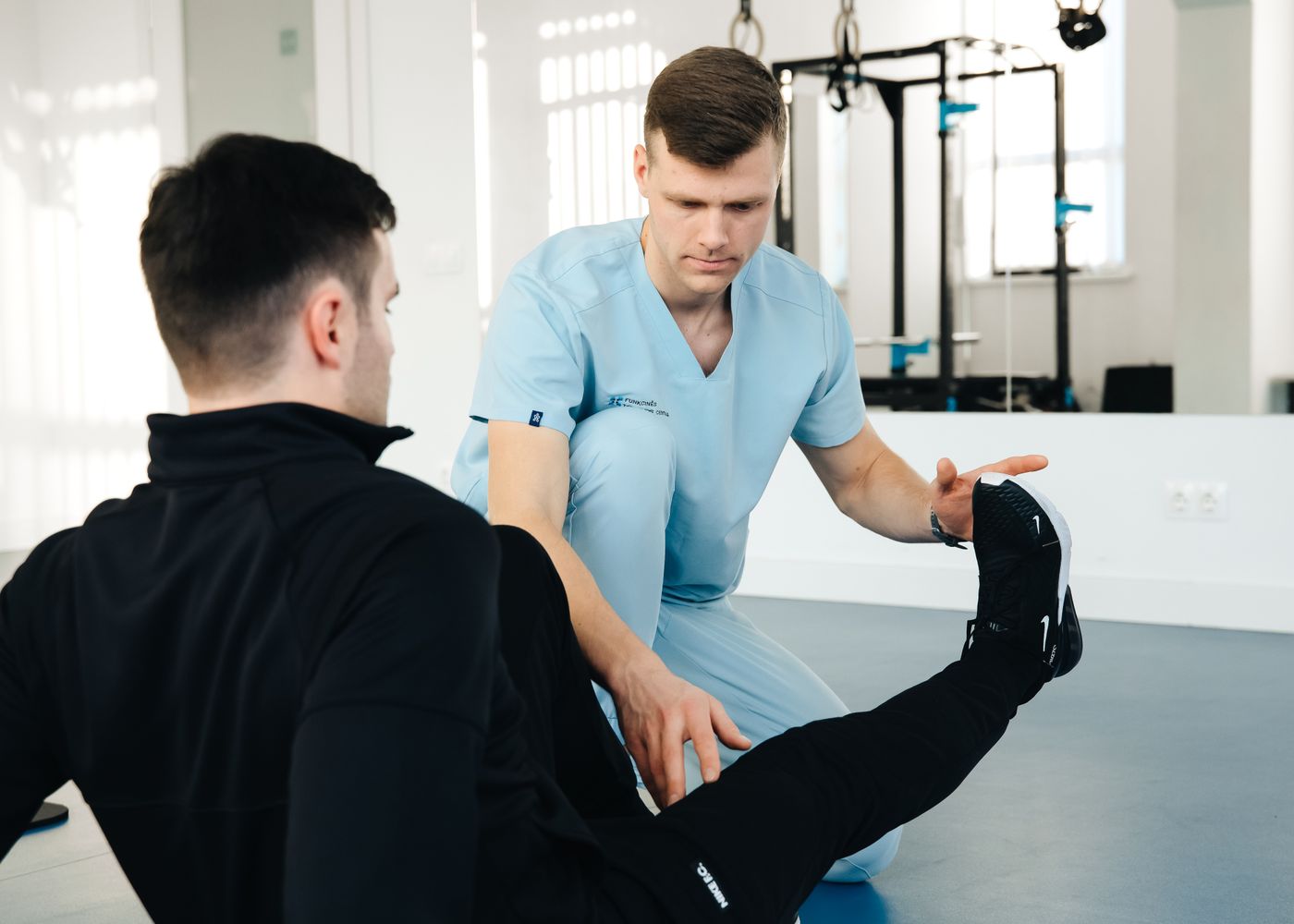 Clinician assessing an athlete